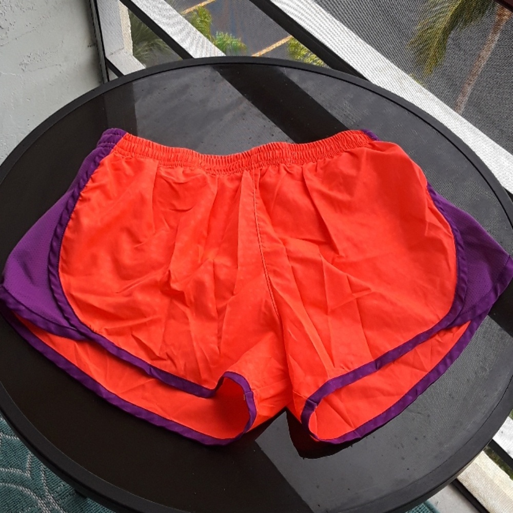 Orange and purple running shorts